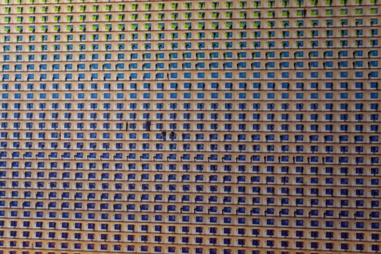 A grid pattern featuring small rectangles in various colors arranged in rows and columns.